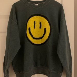 Smiley face crewneck. Size is small/medium. Army green.